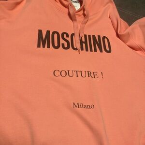 Coral color Moschino hoodie in hoodie